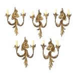 A SET OF FIVE GILT METAL WALL APPLIQUES IN LOUIS XV STYLE