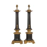 A PAIR OF GILT AND PATINATED METAL TABLE LAMPS IN FRENCH TASTE