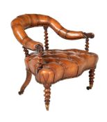 Y A VICTORIAN ROSEWOOD AND LEATHER UPHOLSTERED ARMCHAIR