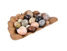 A COLLECTION OF APPROXIMATELY TWENTY FOUR POLISHED STONE MODELS OF EGGS