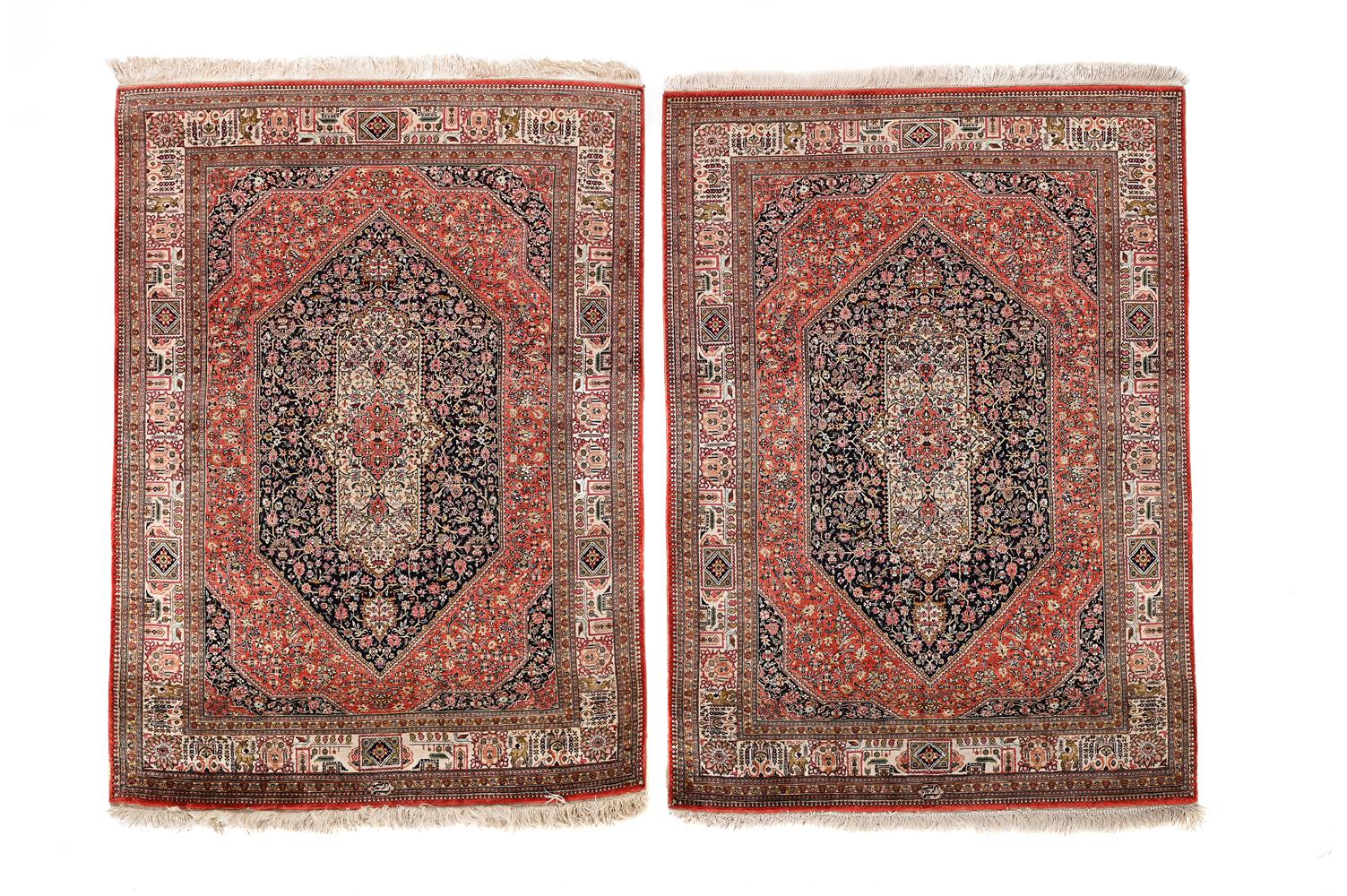 A PAIR OF PART SILK RUGS, IN PERSIAN STYLE