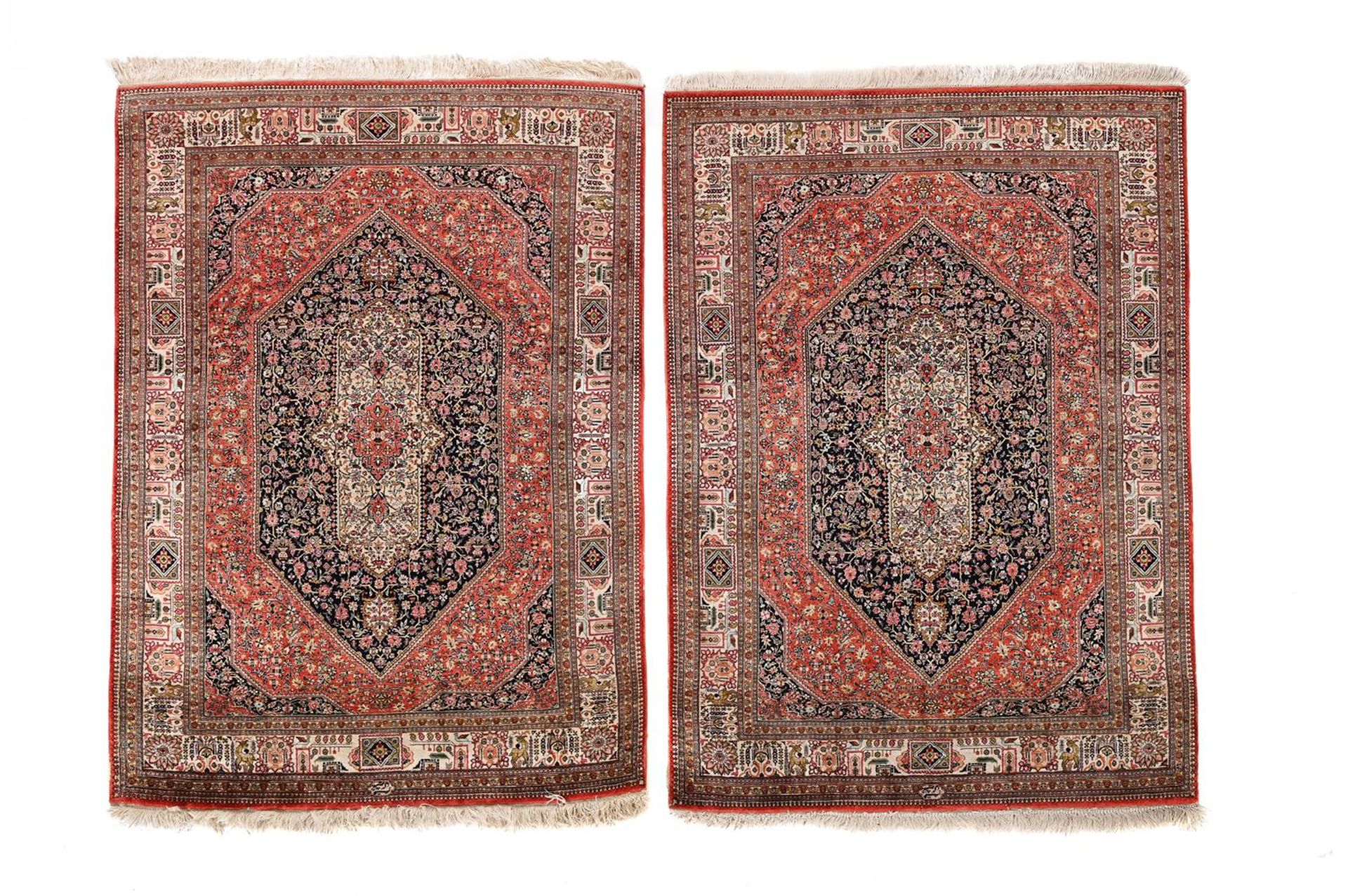 A PAIR OF PART SILK RUGS, IN PERSIAN STYLE