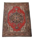 A WOVEN CARPET, PROBABLY TURKISH OR WEST PERSIAN