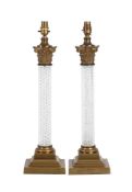 A PAIR OF GILT METAL AND CUT GLASS TABLE LAMPS