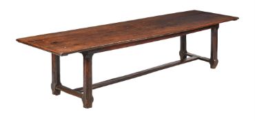 AN OAK AND FRUIT WOOD DINING TABLE OF 'REFECTORY TYPE'