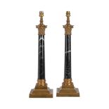 A PAIR OF GILT METAL AND SIMULATED MARBLE TABLE LAMPS
