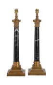 A PAIR OF GILT METAL AND SIMULATED MARBLE TABLE LAMPS