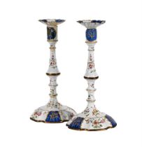 A PAIR OF STAFFORDSHIRE ENAMEL CANDLESTICKS