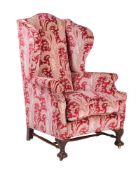 A VICTORIAN MAHOGANY AND UPHOLSTERED ARMCHAIR