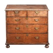 A QUEEN ANNE WALNUT CHEST OF DRAWERS