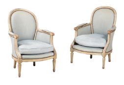 A PAIR OF FRENCH PAINTED AND UPHOLSTERED ARMCHAIRS