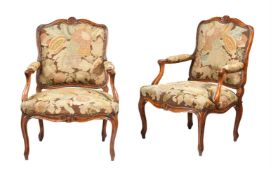 A PAIR OF BEECHWOOD FAUTEUIL ARMCHAIRS IN LOUIS XV DESIGN