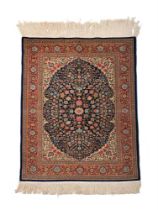 A PART SILK RUG IN PERISAN STYLE