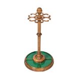 AN OAK AND BRASS MOUNTED CIRCULAR STICK STAND