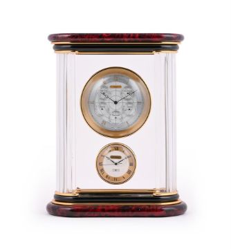 A RED MARBLE, CRYSTAL AND GILT METAL WORLD TIME CLOCK