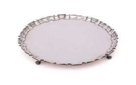 A SILVER SHAPED CIRCULAR SALVER