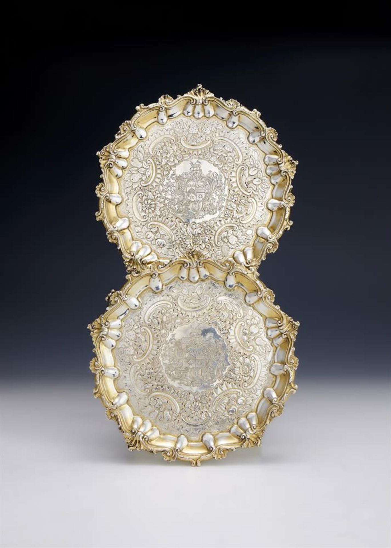 A PAIR OF GEORGE III SILVER GILT SALVERS