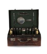 Y A CROCODILE LEATHER TRAVEL CASE WITH SILVER MOUNTED DRESSING TABLE ITEMS