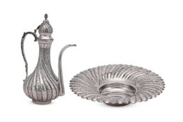 A TURKISH SILVER COLOURED BALUSTER EWER AND SHAPED CIRCULAR BOWL