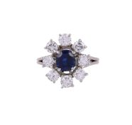 A FRENCH SAPPHIRE AND DIAMOND CLUSTER RING, POSSIBLY CIVANYAN