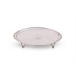 A GEORGE III SILVER OVAL TEAPOT STAND