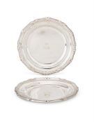 A PAIR OF FRENCH SILVER SHAPED CIRCULAR PLATES