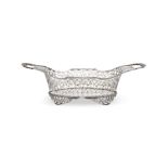A CONTINENTAL SILVER TWIN HANDLED SHAPED OVAL PIERCED BASKET