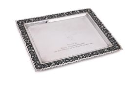 AN INDONESIAN SILVER COLOURED SHAPED RECTANGULAR TRAY