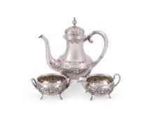 A CONTINENTAL SILVER COLOURED THREE PIECE TEA SET