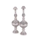 A MATCHED PAIR OF MIDDLE EASTERN SILVER COLOURED ROSE WATER SPRINKLERS
