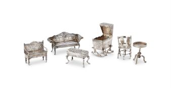 A COLLECTION OF SILVER MINIATURE FURNITURE