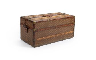 LOUIS VUITTON, A MONOGRAMMED COATED CANVAS HARD TRAVELLING TRUNK