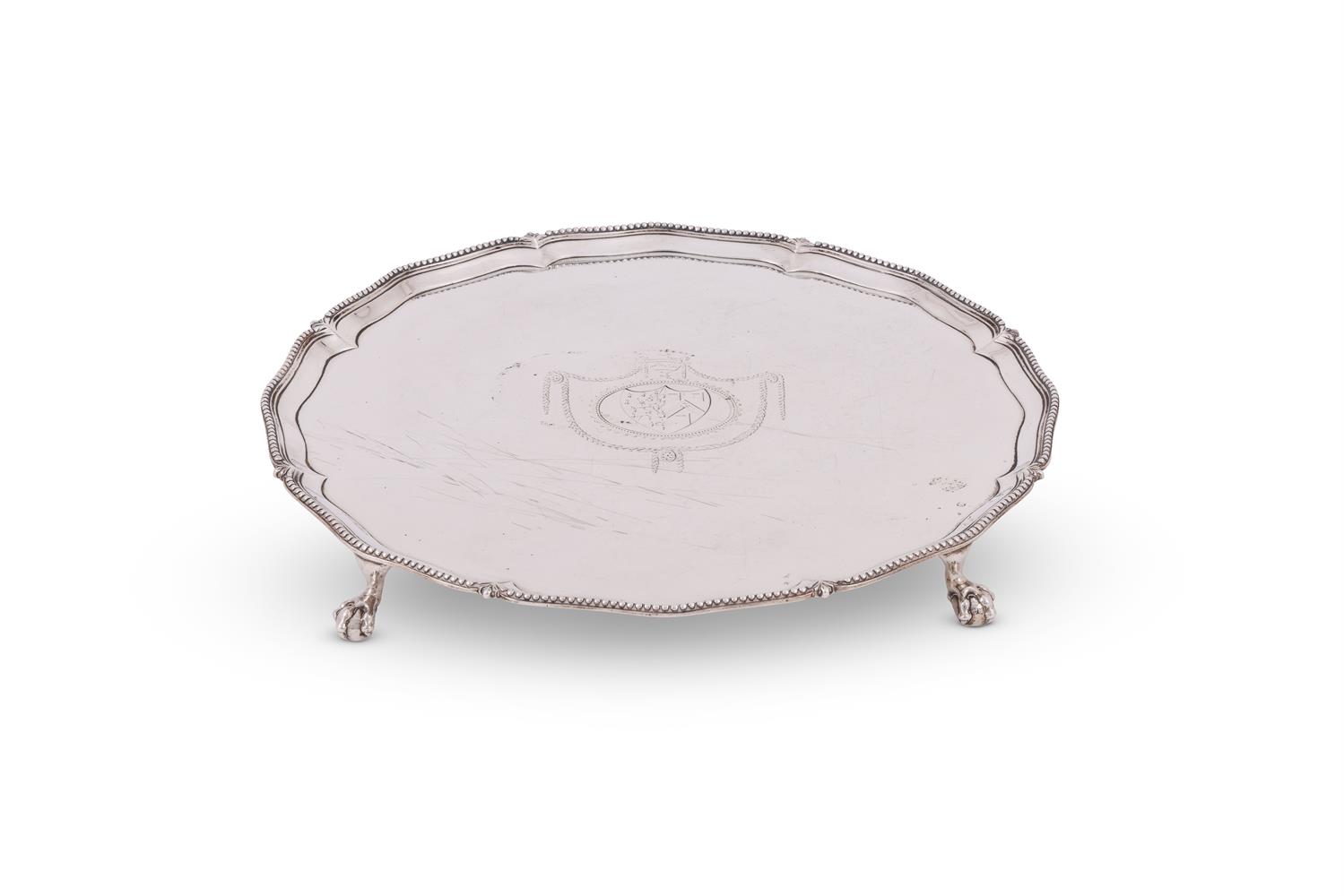 A GEORGE III SILVER SHAPED CIRCULAR SALVER