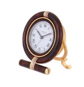 CARTIER, REF. 7522, A BRASS AND BROWN LACQUER TRAVEL ALARM DESK CLOCK