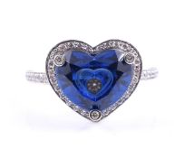CHOPARD, SO HAPPY, A DIAMOND AND SYNTHETIC BLUE STONE HEART RING