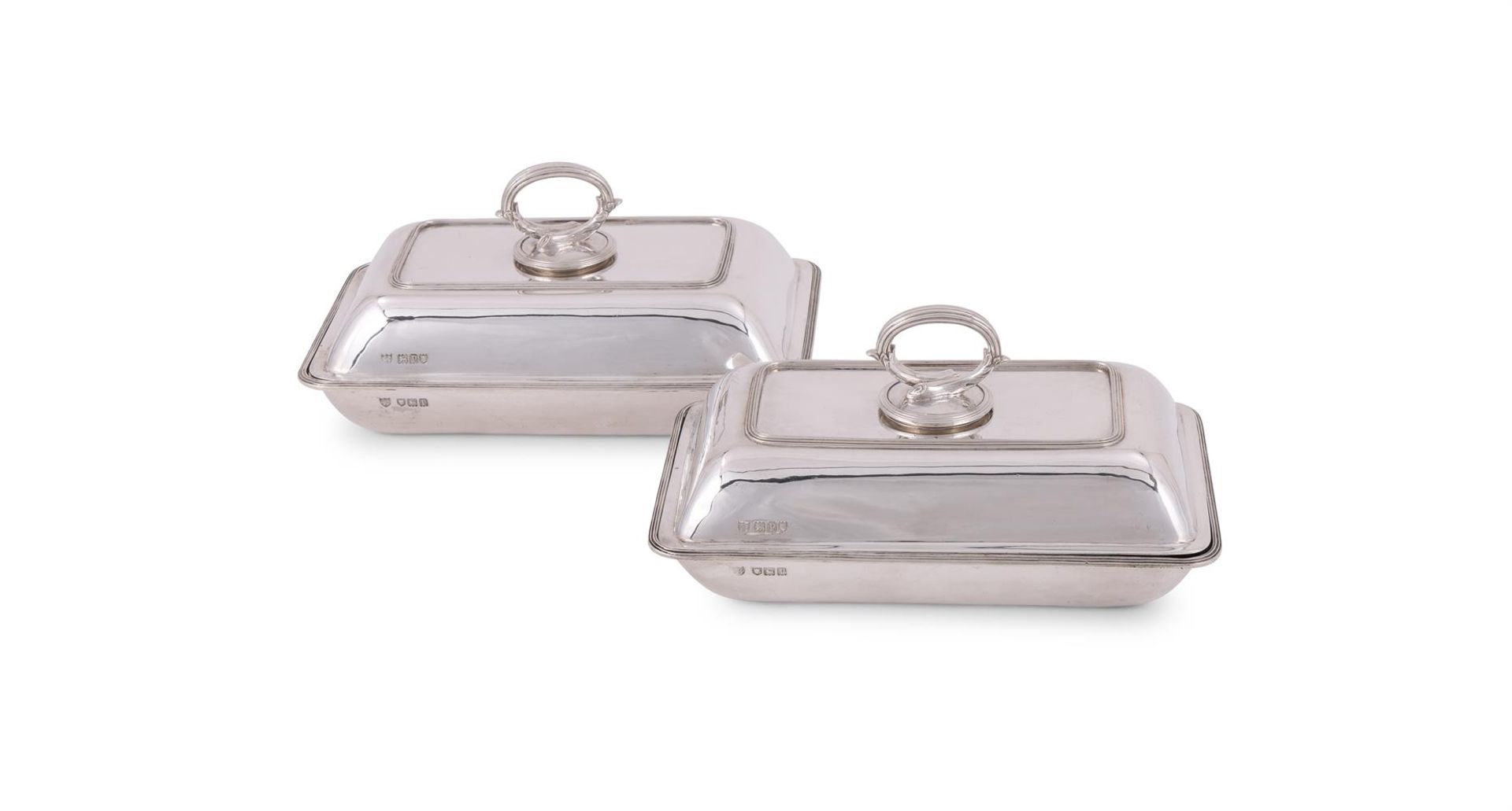 A PAIR OF SILVER ENTREE DISHES, COVERS AND HANDLES