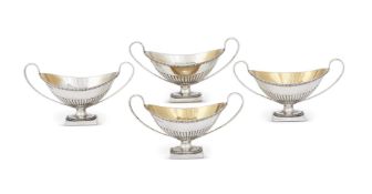 A SET OF FOUR VICTORIAN SILVER NAVETTE SHAPED SALTS