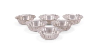 A SET OF FIVE SILVER SHAPED CIRCULAR SUNDAE DISHES