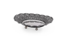 AN INDONESIAN SILVER COLOURED LARGE SHAPED OVAL BASKET