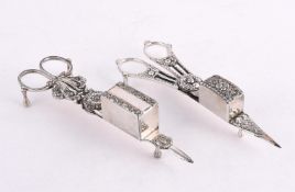 TWO PAIRS OF ELECTRO-PLATED CANDLESNUFFERS