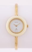 GUCCI, REF. 1100-L, A LADY'S GOLD PLATED BRACELET WATCH WITH INTERCHANGEABLE BEZELS