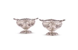 A MATCHED PAIR OF SILVER SHAPED OVAL PIERCED PEDESTAL DISHES