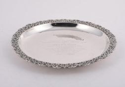 AN EGYPTIAN SILVER SHAPED CIRCULAR TROPHY PLATE