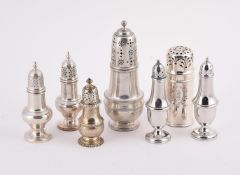 A COLLECTION OF AMERICAN SILVER CASTORS AND PEPPERETTES