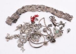 A COLLECTION OF VICTORIAN AND LATER SILVER AND SILVER COLOURED JEWELLERY