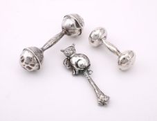 THREE SILVER COLOURED RATTLES