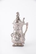 AN ELECTROPLATED BALUSTER LIDDED JUG