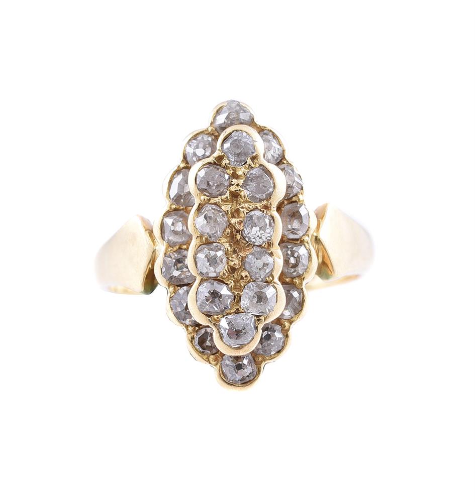 A MARQUISE PANEL DIAMOND CLUSTER RING, LONDON 1988