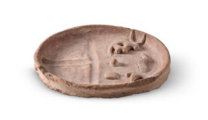 AN EGYPTIAN TERRACOTTA OFFERING TRAY, MIDDLE KINGDOM CIRCA 1987-1640 B.C.