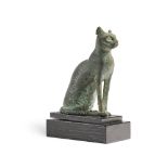 AN EGYPTIAN BRONZE FIGURE OF A SEATED CAT, LATE PERIOD, CIRCA 664-525 B.C